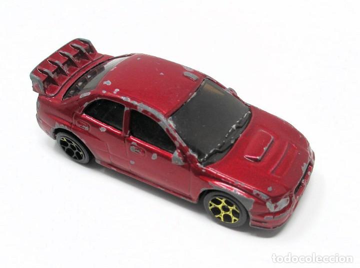 Coches a escala: Subaru Impreza WCR de Majorette - Escala 1/57. Ref. 275A.