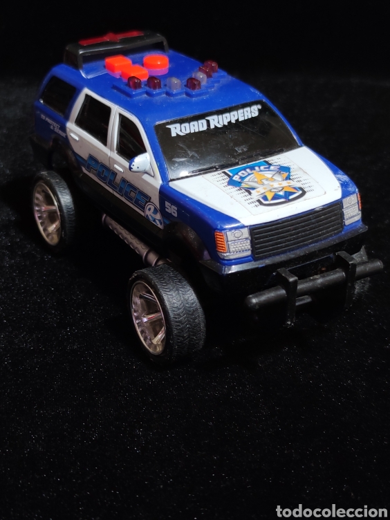 Auto in scala: Figura coche policia Road Rippers,con sonido y luz pero no funciona, de plastico duro. Toy State.