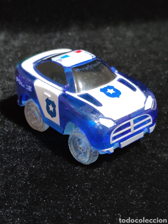 Auto in scala: Figura coche policia. Funciona a pilas.