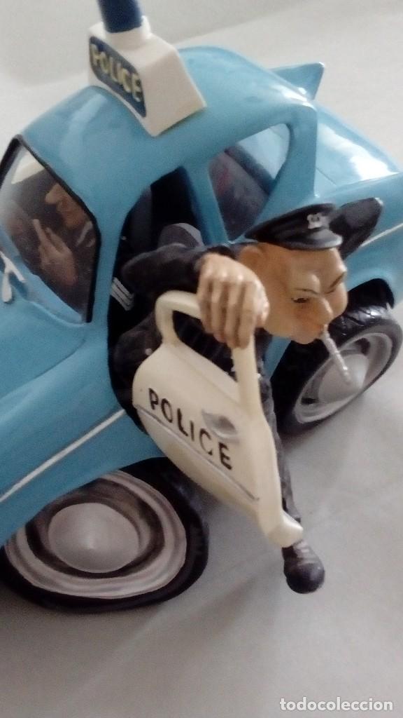 Coches a escala: Coche de Policia Carkeys y Clutch de la serie Car Couture