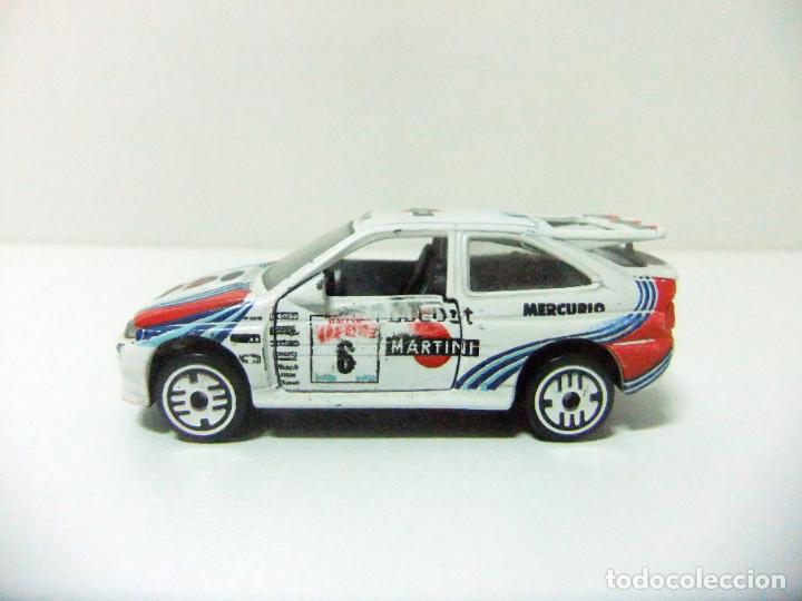 Coches a escala: FORD ESCORT WRC RALLYE RALLY SAN REMO MARTINI JOLY CLUB GUISVAL ESCALA 1:64 APROX. COCHE MINIATURA