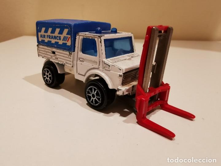 Coches a escala: Majorette Unimog 1/64