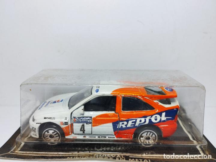 Coches a escala: FORD ESCORT WRC REPSOL CARLOS SAINZ MOYA DE GUISVAL CAMPEON 1,64 NUEVO EN SU CAJA