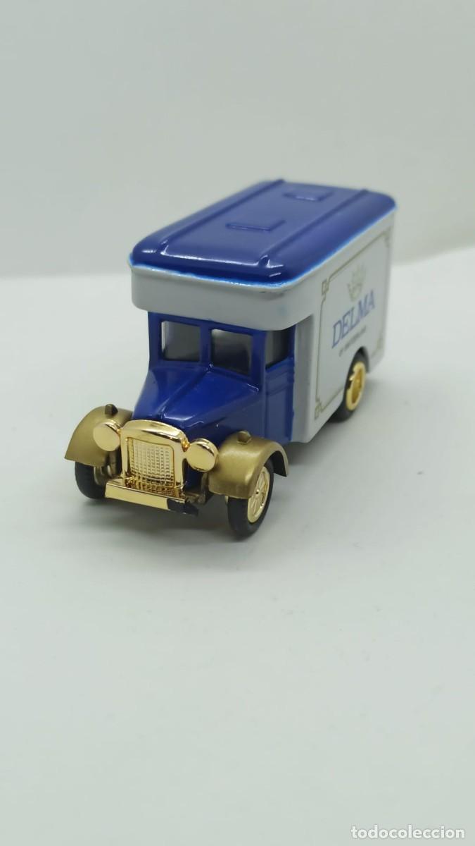 Carros em escala: Cami&oacute;n Delma escala Golden Wheel Diecast con defecto
