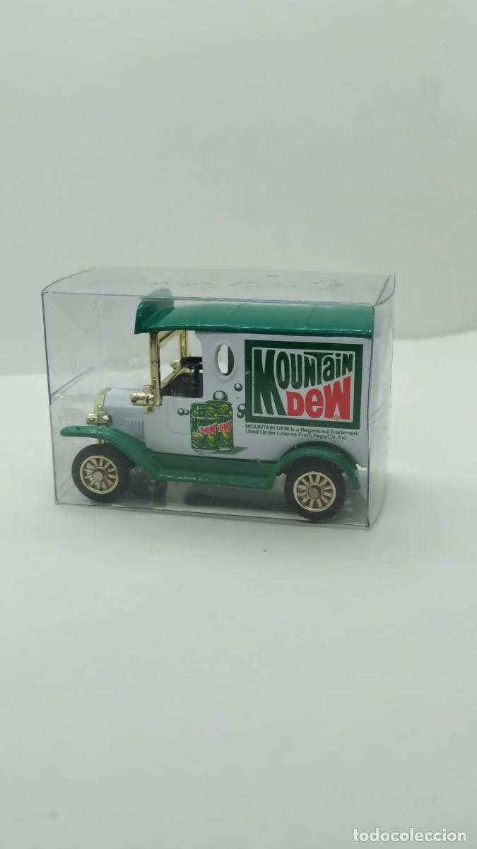 Carros em escala: Cami&oacute;n Mountain Dew escala Golden Wheel Diecast