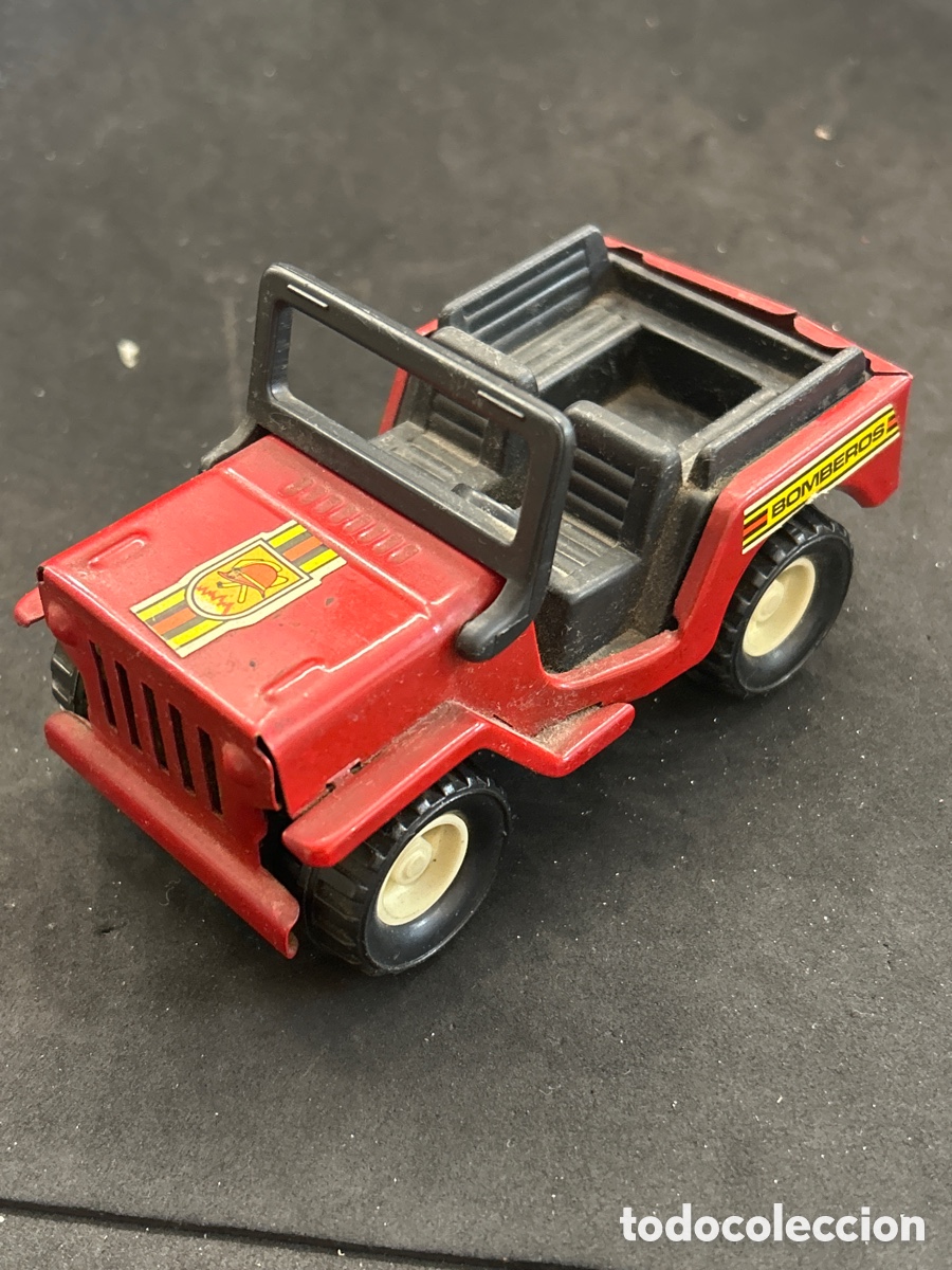 Coches a escala: Jeep de Gozan, hojalata y pl&aacute;stico