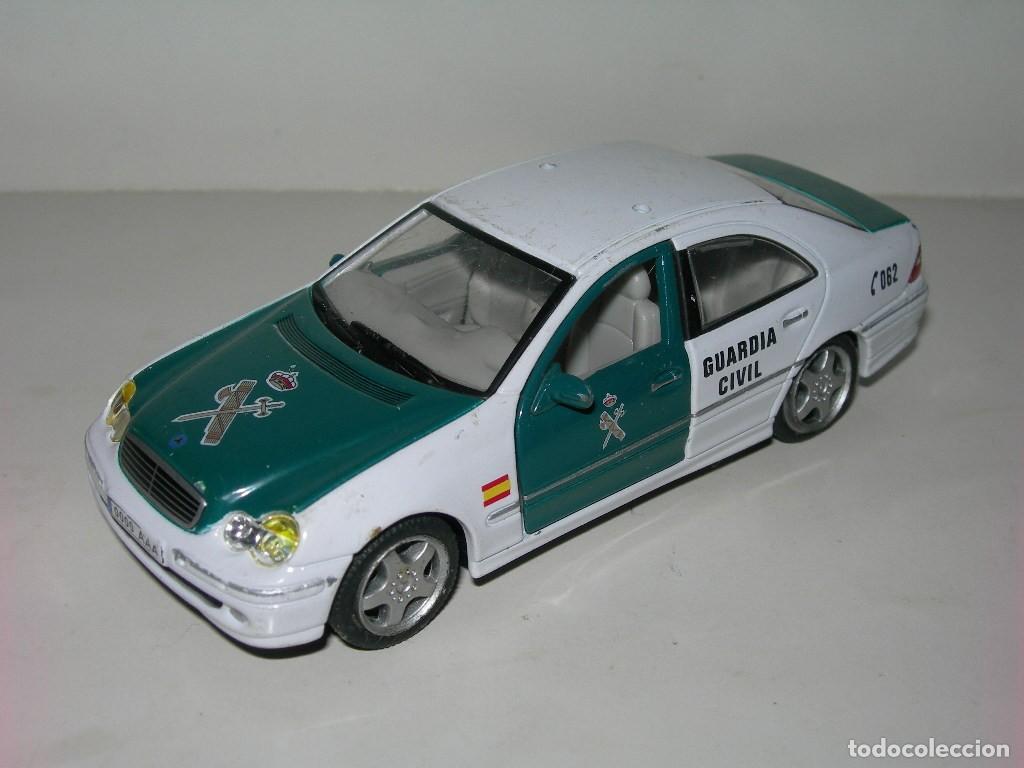 Coches a escala: COCHE DE METAL MERCEDES CLASE C - GUARDIA CIVIL - ESCALA APROXIMADA 1/43 - FABRICADO POR HONGWELL -