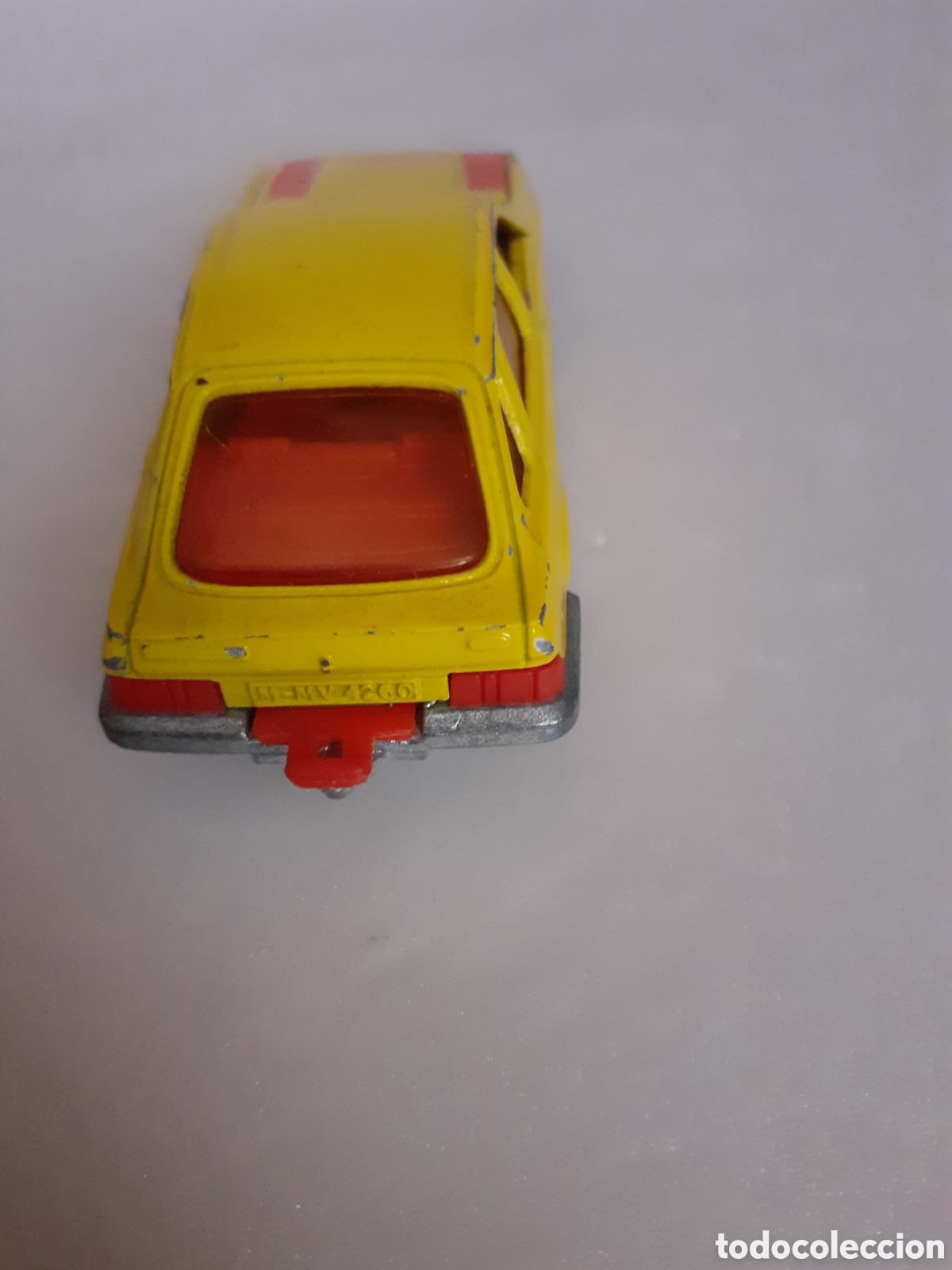 Coches a escala: MAJORETTE FORD SIERRA AMARILLO CHASIS METAL - Foto 2