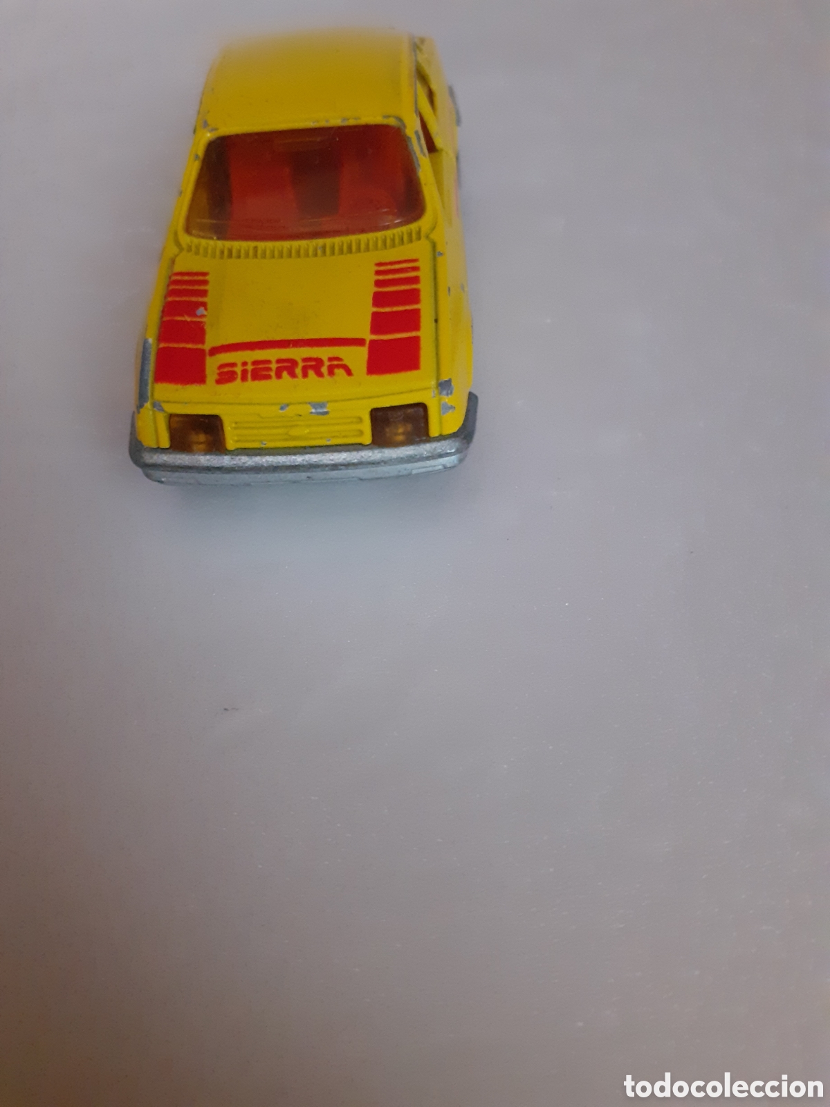 Coches a escala: MAJORETTE FORD SIERRA AMARILLO CHASIS METAL - Foto 4