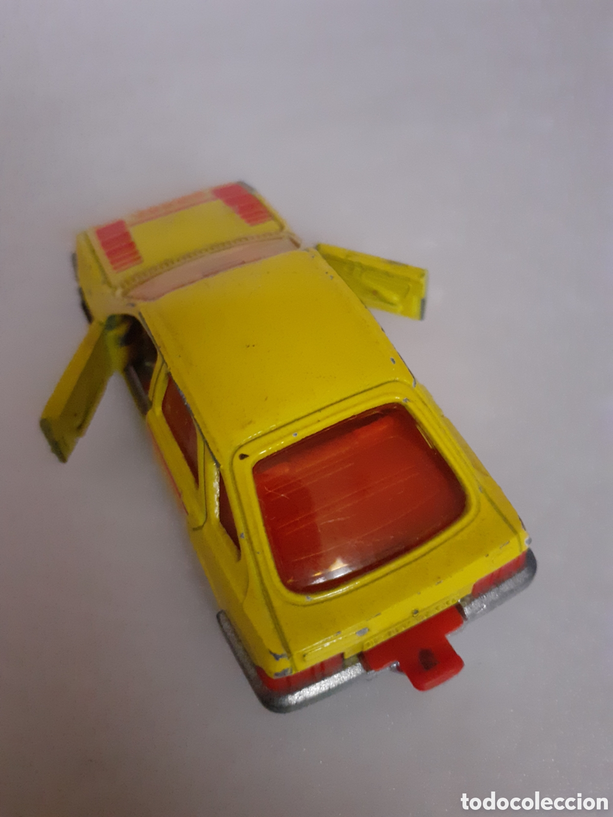 Coches a escala: MAJORETTE FORD SIERRA AMARILLO CHASIS METAL - Foto 5