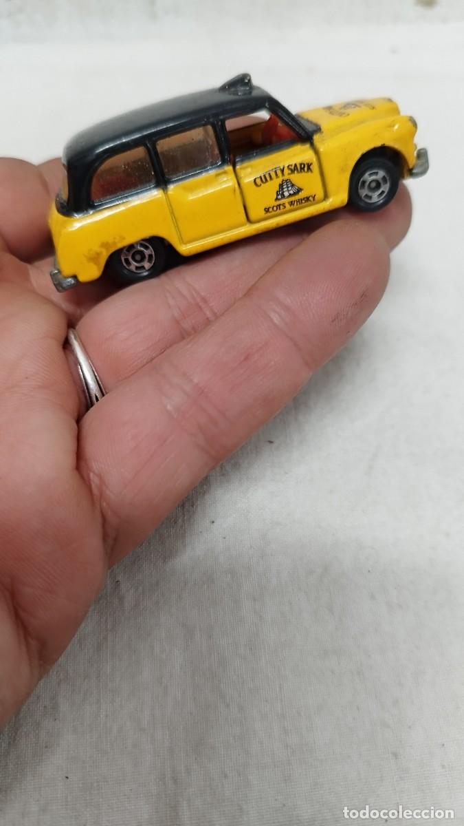 Coches a escala: Antiguo coche de juguete deetal,Austin Taxi Cab N&deg;12 marca t&oacute;nica a&ntilde;o 1978 Tomy.Cutty Shark, promo