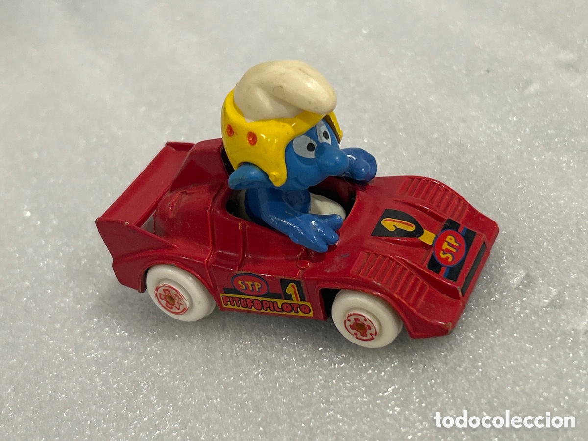 Coches a escala: COCHE B&Oacute;LIDO PITUFO PILOTO STP 1 - GUISVAL - FIGURA MU&Ntilde;ECO PITUFOS PEYO SMURF SMURFS CARRERAS