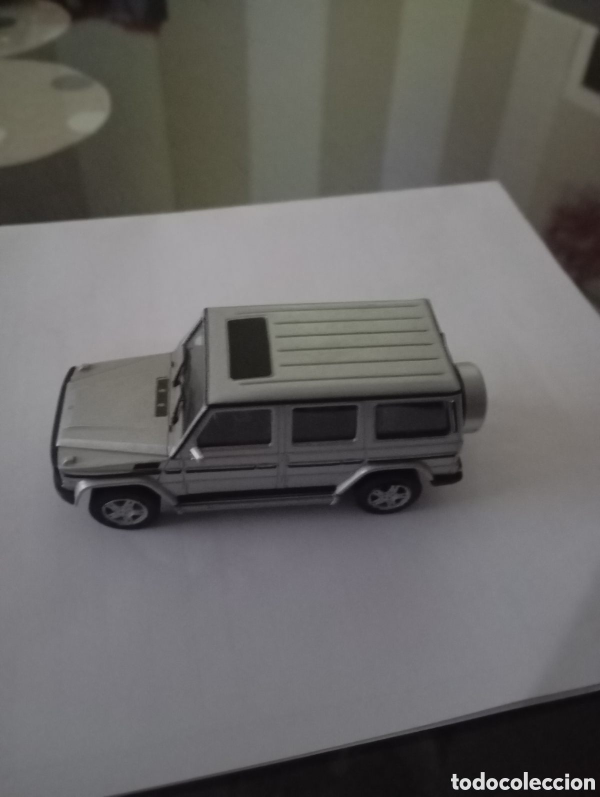 Coches a escala: Mercedes Benz G, color gris, del a&ntilde;o 1993, metal, escala 1:43