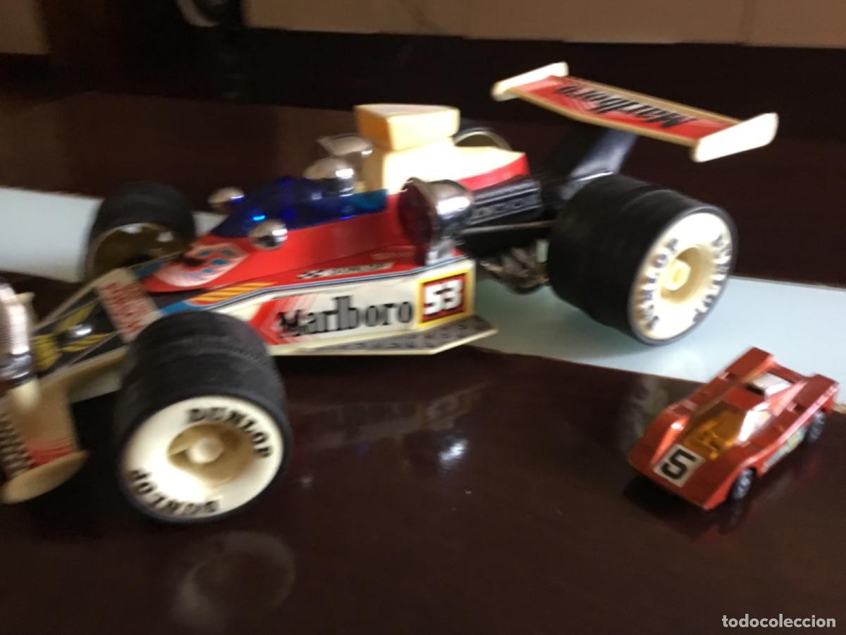 Coches a escala: Antiguo coche formula 1 pilas - Foto 4
