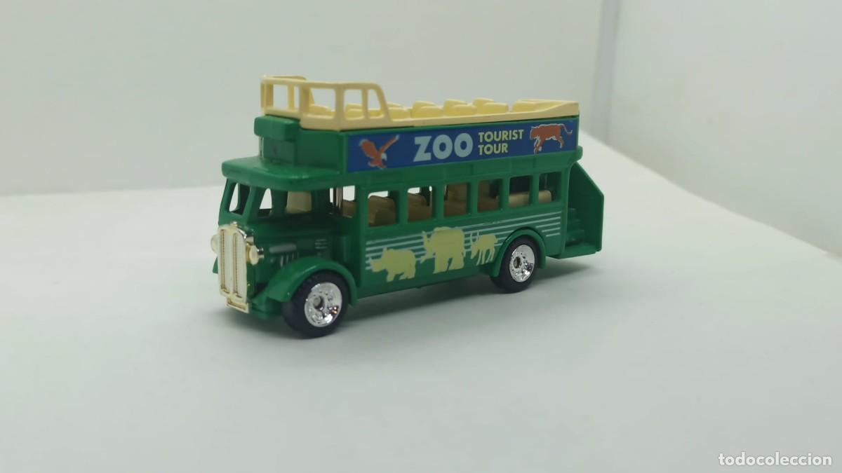 Carros em escala: Cami&oacute;n autob&uacute;s tur&iacute;stico del zoo escala Golden Wheel Diecast