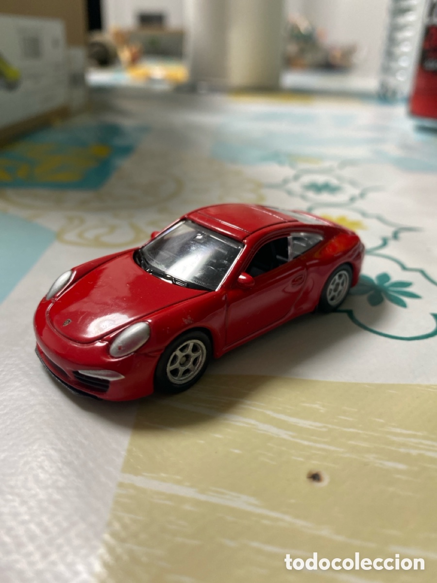Coches a escala: Coche Porsche escala 1:60/64 marca Welly