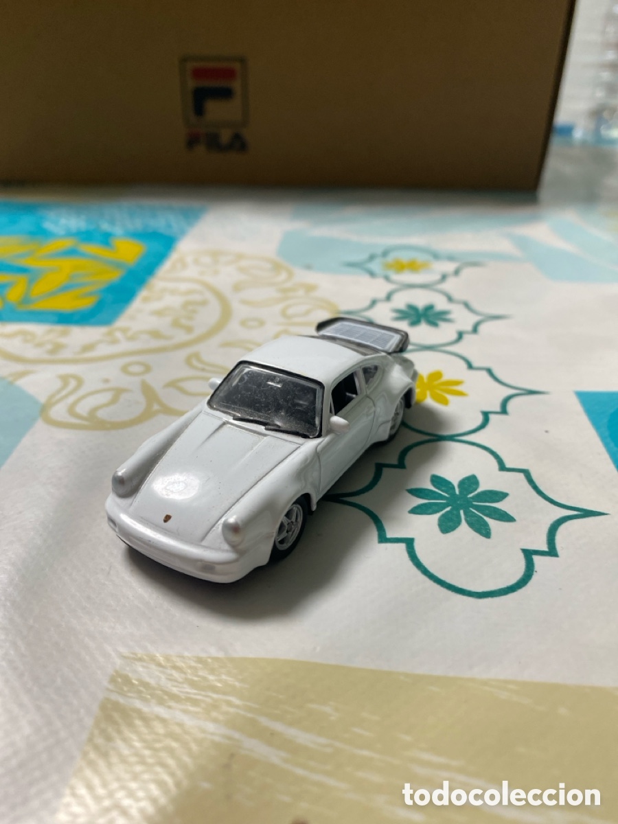 Coches a escala: Coche Porsche 911 escala 1:60 marca Welly