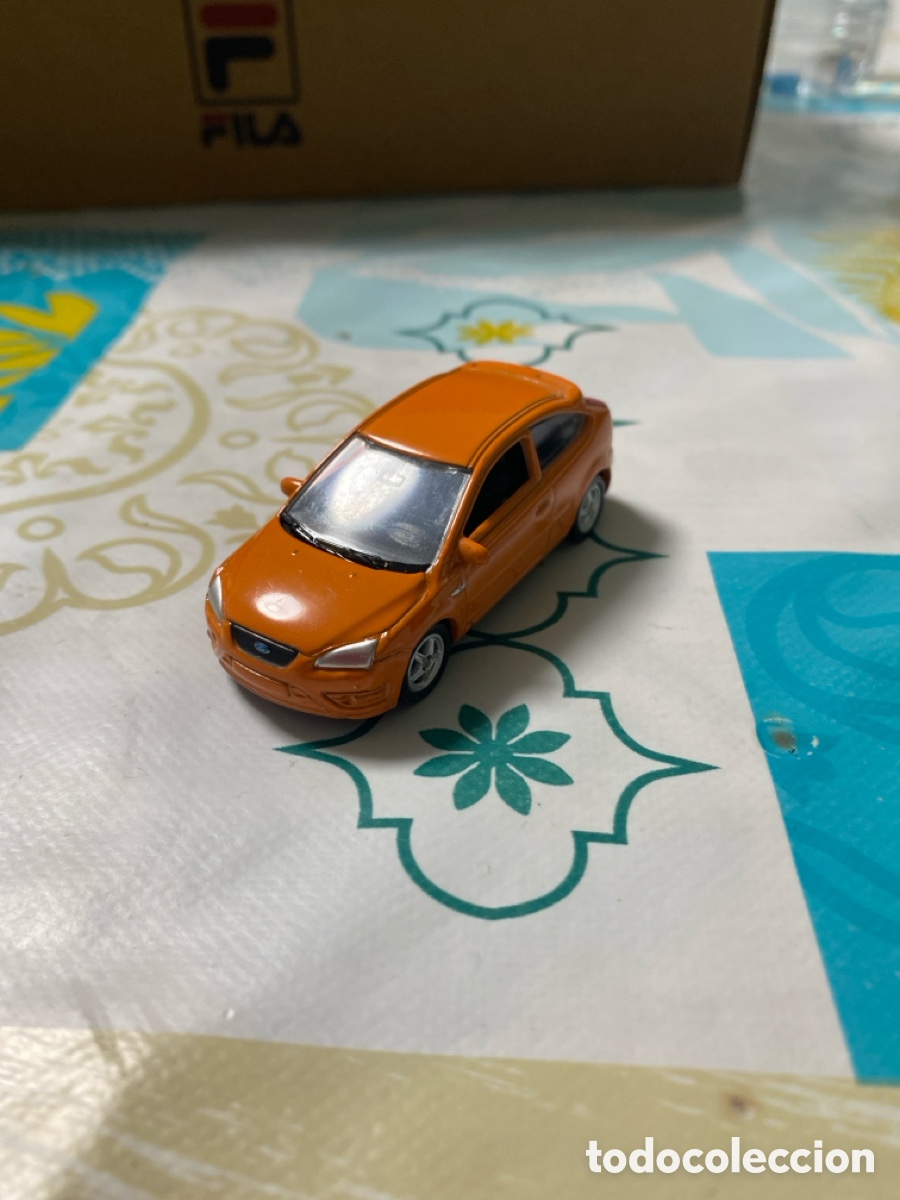Coches a escala: Coche Ford Focus ST escala 1:60 marca Welly