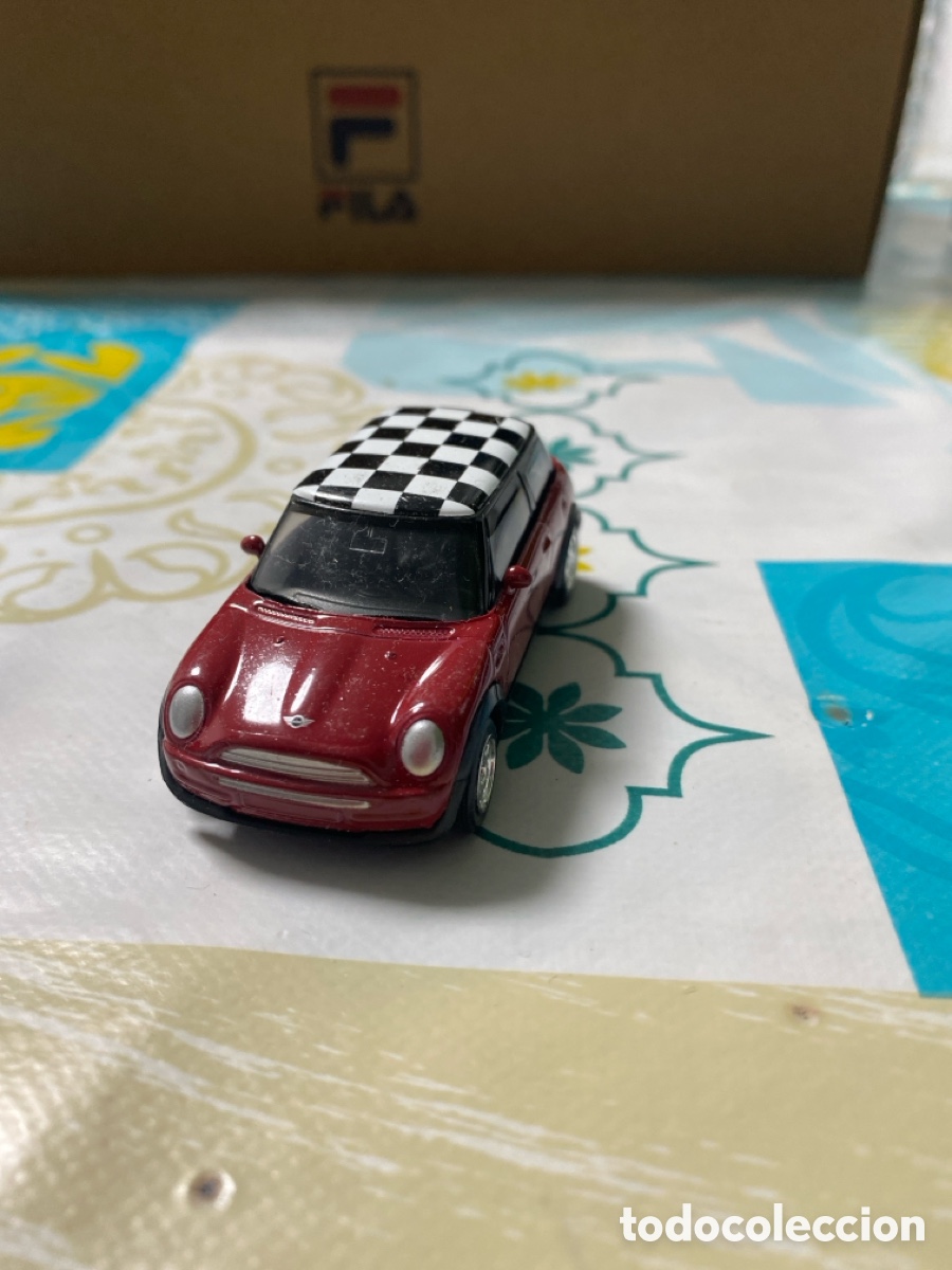 Coches a escala: Coche Mini Cooper escala 1:60 marca Welly