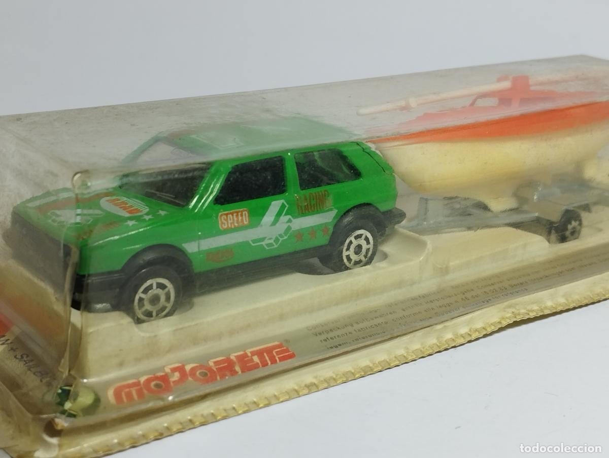 Coches a escala: VOLKSWAGEN GOLF II GTI CON REMOLQUE BARCO DE MAJORETTE 1,64 NUEVO EN CAJA