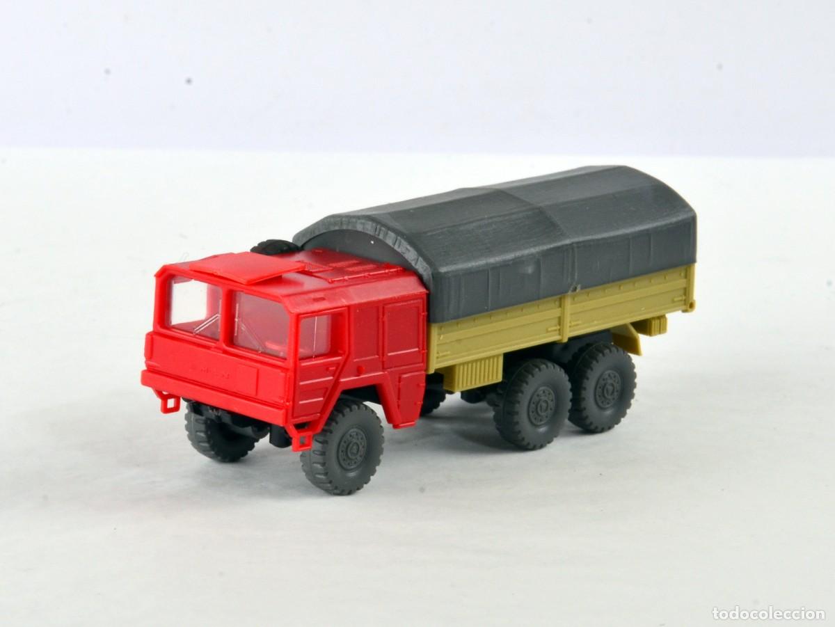 Coches a escala: Roskopf Escala 1:87 H0 MAN 4x4 7Ton Naranja Impecable en su Blister