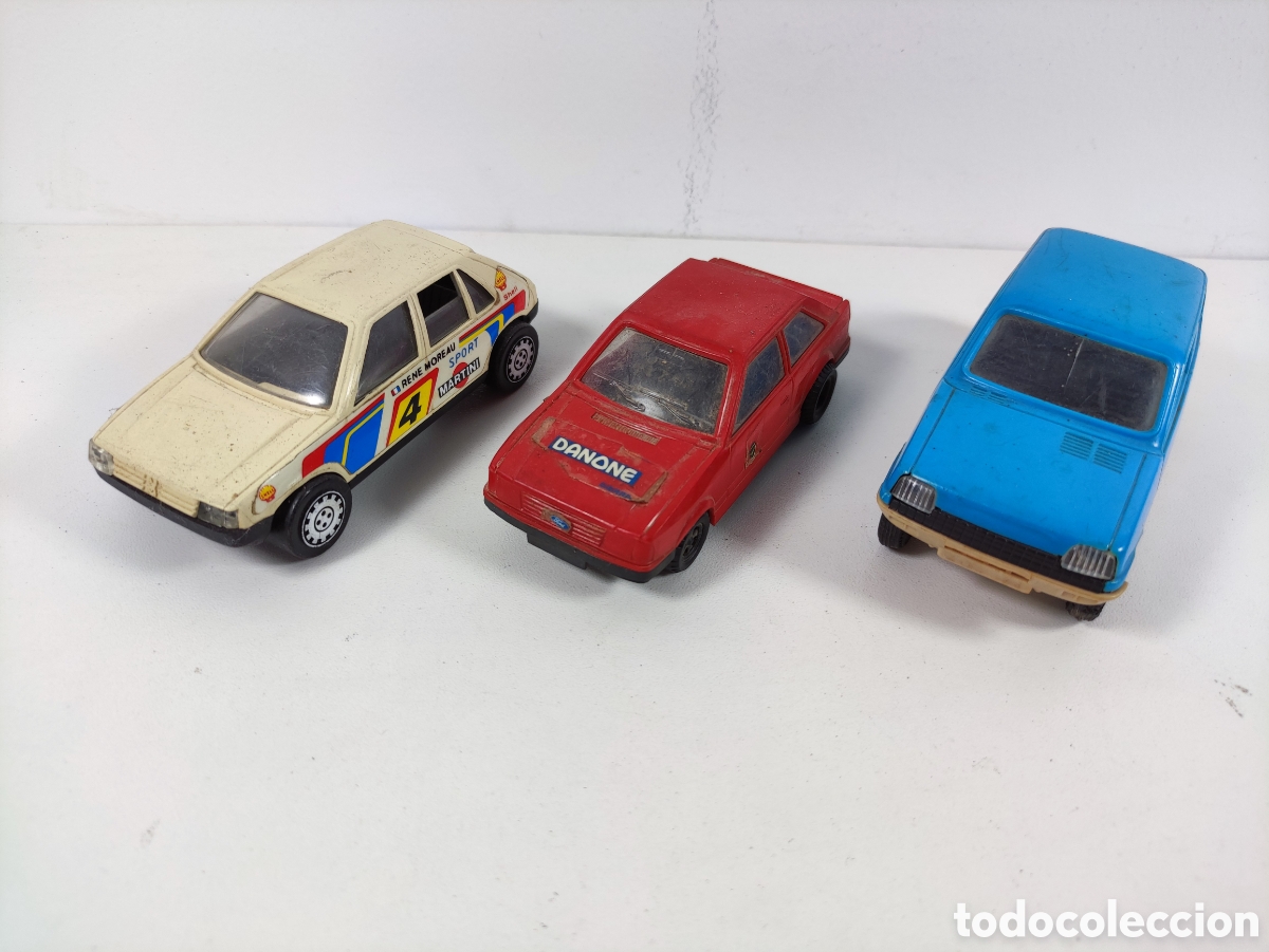 Coches a escala: Lote Peugeot 205 y Renault 5 de Gozan y Ford escort de transplastic Danone