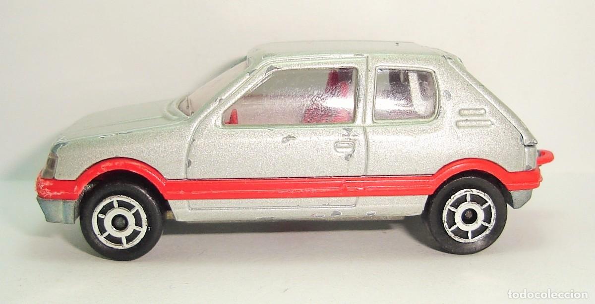 Coches a escala: PEUGEOT 205 GTI MAJORETTE ESCALA 1:53 LOTE 13
