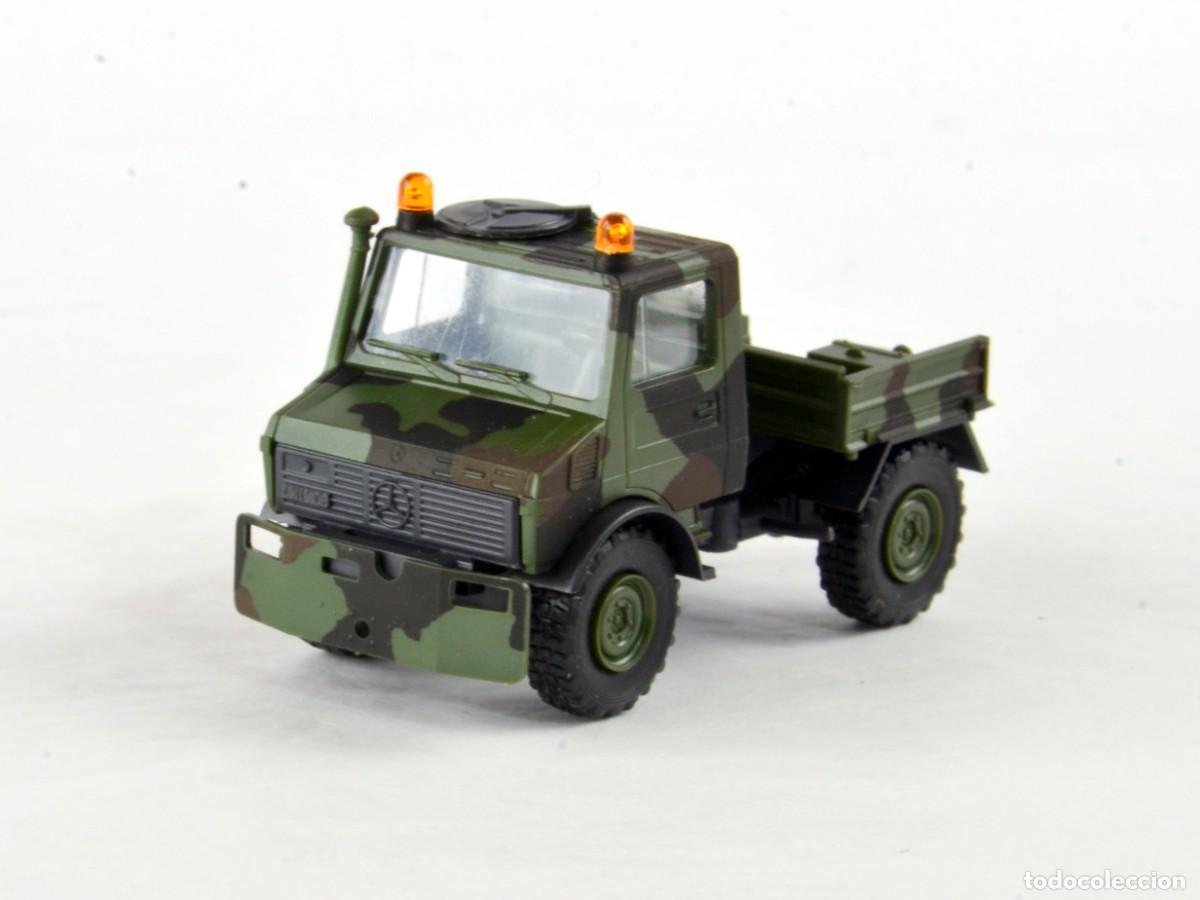 Coches a escala: Roco Minitanks Escala 1:87 H0 827/1 Unimog Militar Remolcador de Aeronaves Impecable con Caja