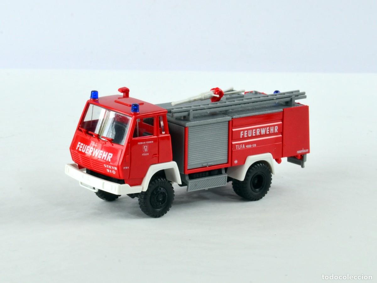 Coches a escala: Roco Escala 1:87 H0 Cami&oacute;n de Bomberos Steyr 91 TLFA 4000-120 Hall Tirol Impecable con Caja