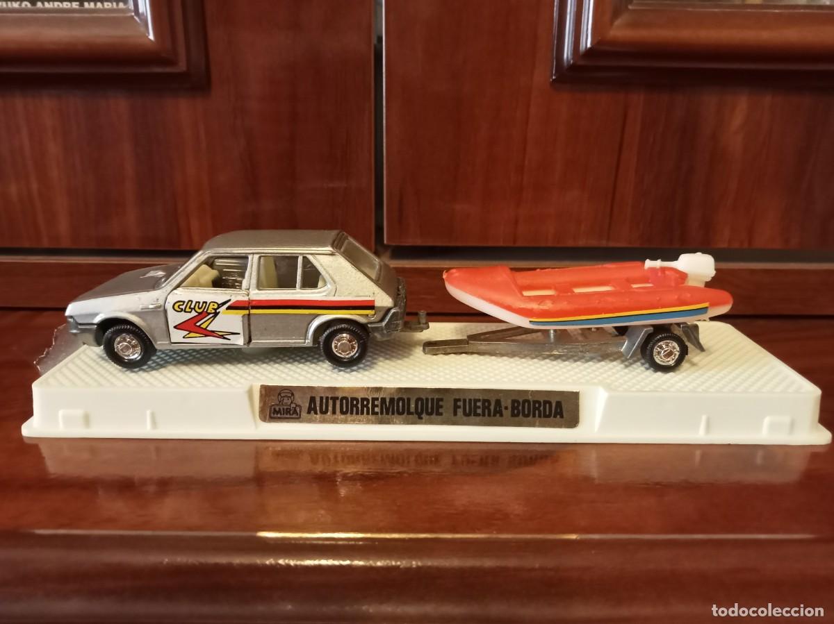 Coches a escala: Mira Autorremolque fuera borda