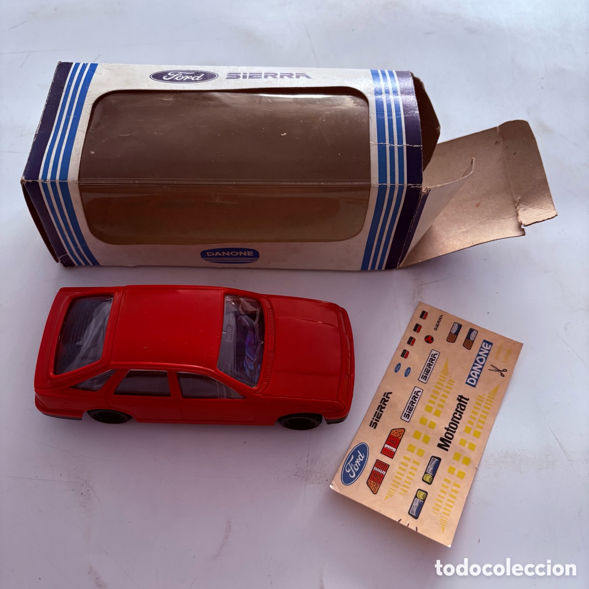 Coches a escala: Coches Ford Sierra rojo premio de Danone a&ntilde;os 80