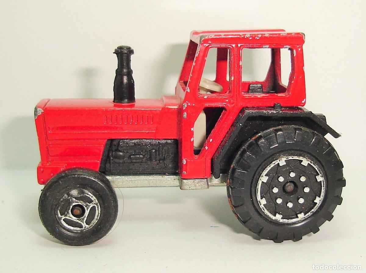 Coches a escala: TRACTOR FORD MAJORETTE ESCALA 1:65 LOTE 31
