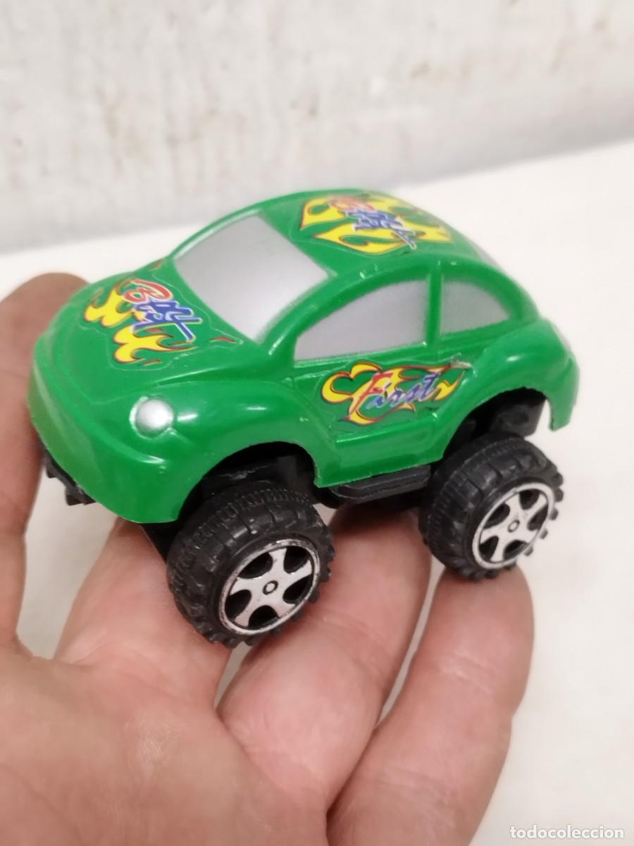 Modellautos: Coche juguete retr&aacute;ctil, de pl&aacute;stico.