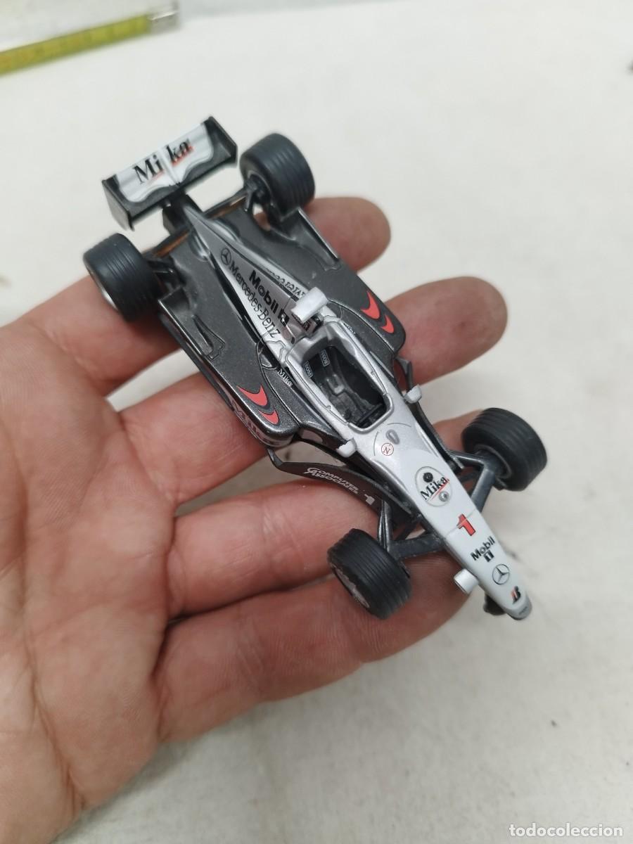 Carros em escala: Coche de juguete de formula 1. Mercedes, RBA editores.