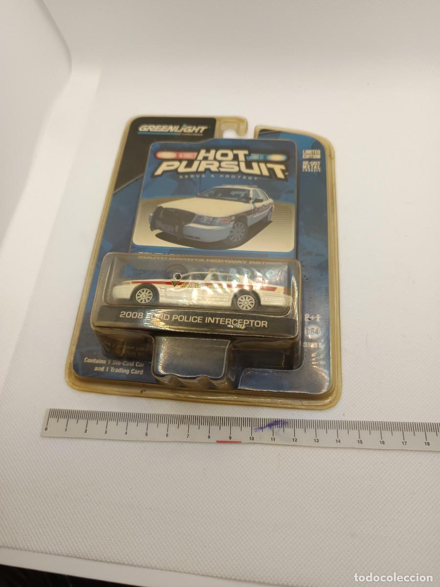 Coches a escala: Ford Crown Victoria 2008 South Dakota State Patrol Greenlight escala 1:64 Hot Pursuit