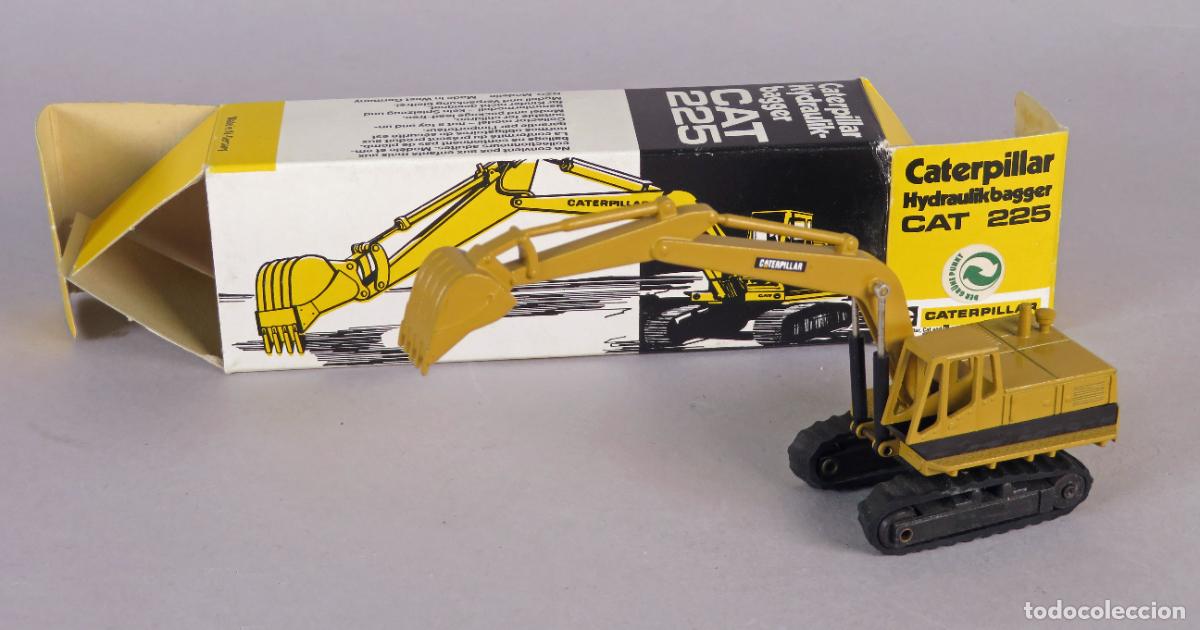 Coches a escala: Excavadora hidr&aacute;ulica Caterpillar NZG 225 Western Germany con caja escala peque&ntilde;a