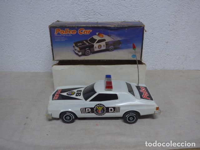 Coches a escala: Antiguo gran coche de juguete Police car de SIUCA, policia. original en su caja.
