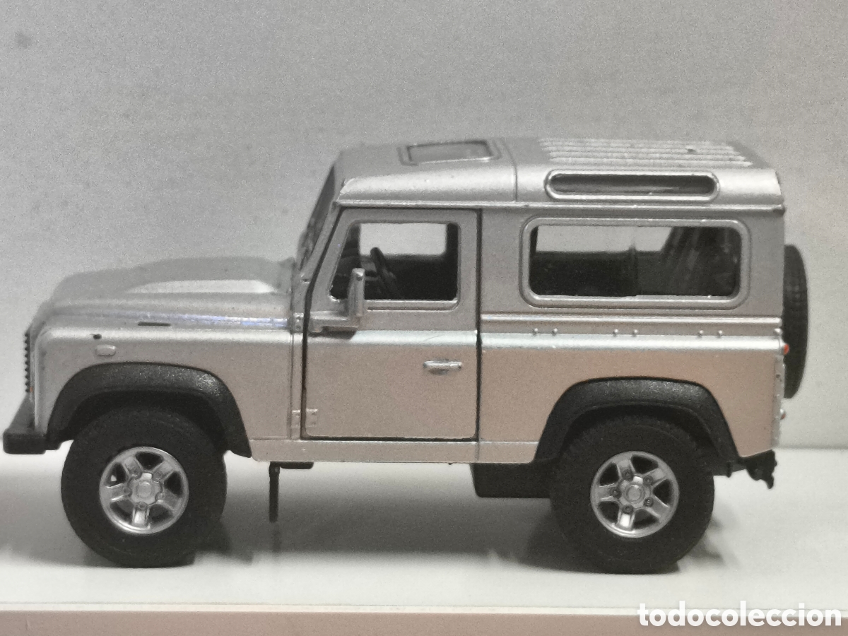 Coches a escala: Land rover defender gris plata welly buen estado