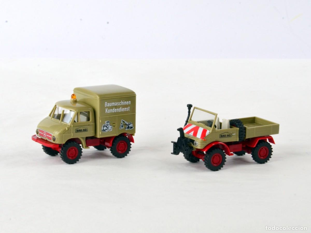 Coches a escala: Brekina Escala 1:87 H0 Juego de Dos Unimog 411 Bau AG Impecable con Caja