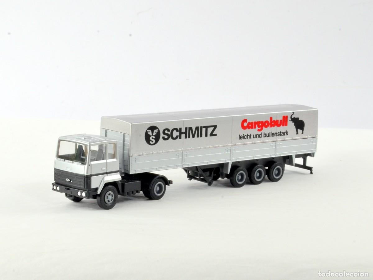 Coches a escala: Herpa Escala 1:87 H0 Cami&oacute;n Articulado Ford Transcontinental Schmitz Cargobull con Caja