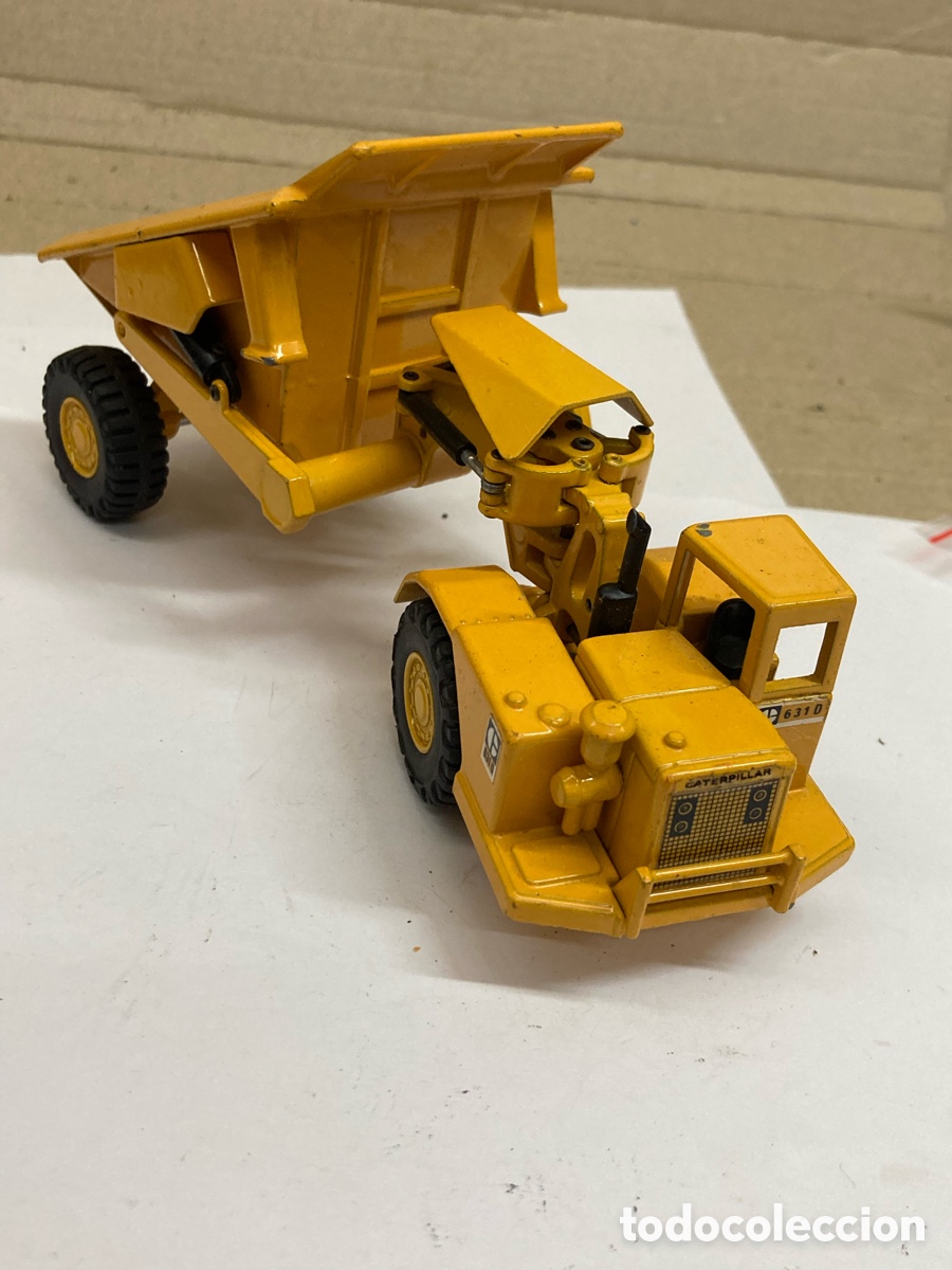 Coches a escala: r&eacute;plica a escala 1:70 del volquete Caterpillar 631D fabricada por la marca Joal