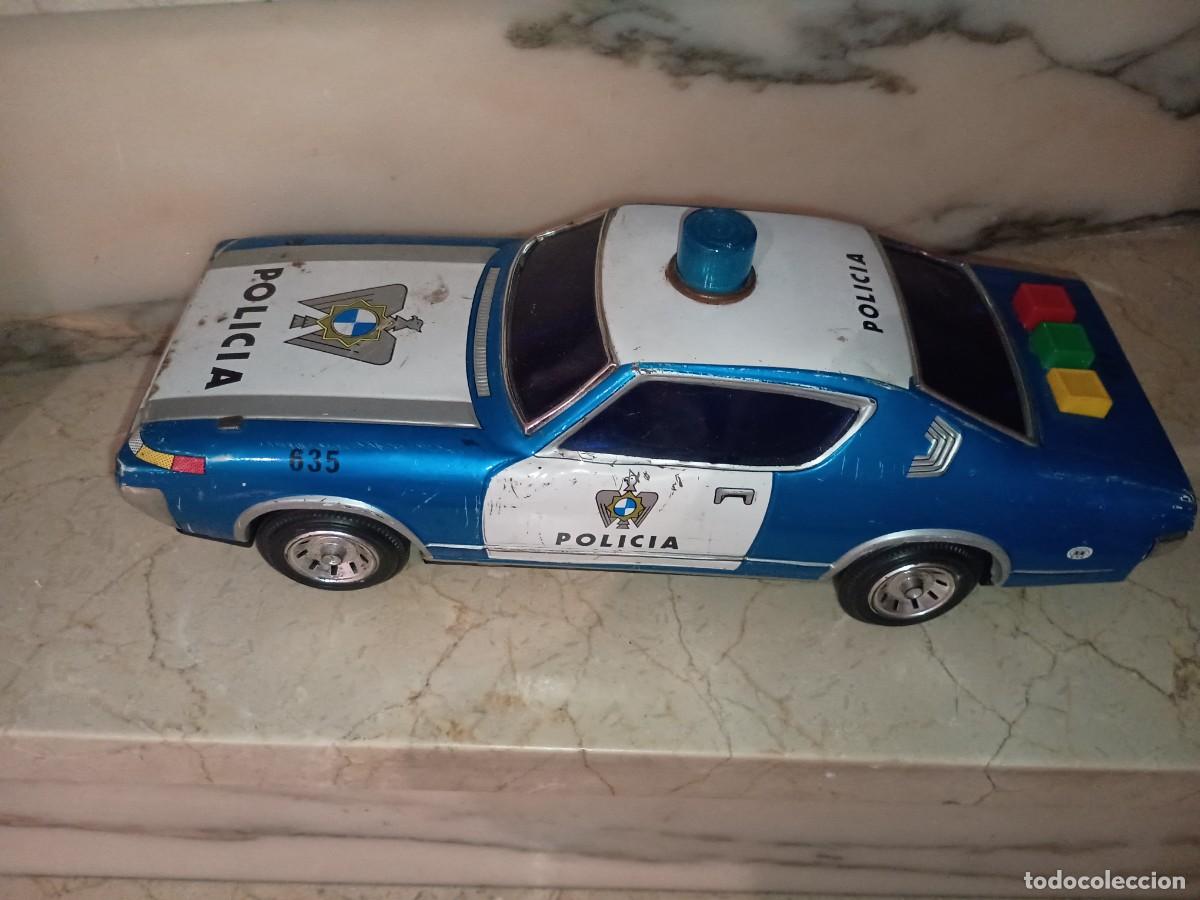 Coches a escala: Coche de polic&iacute;a tal y como se ve en las fotos