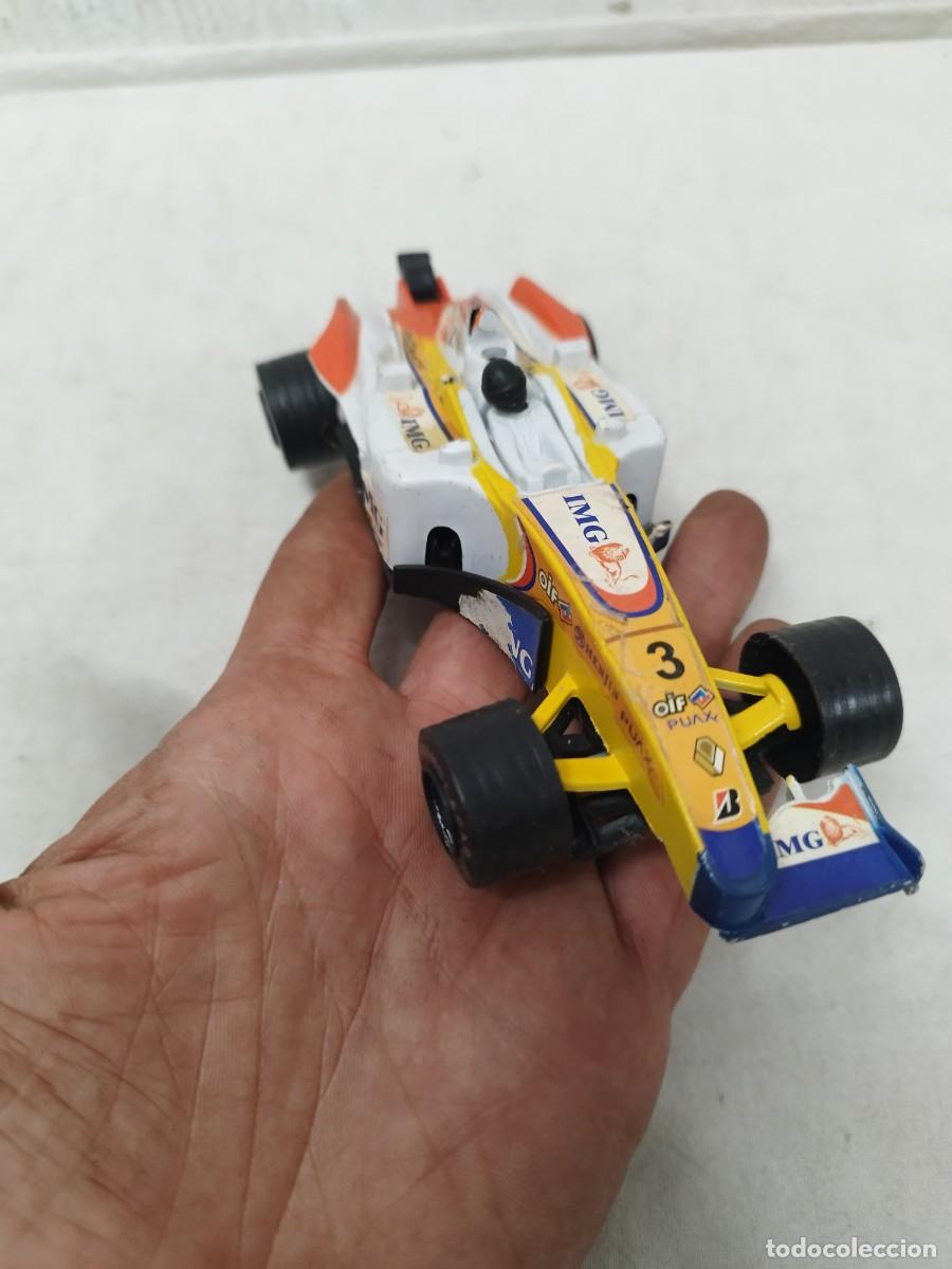 Coches a escala: Coche de juguete de formula 1. En el estado que se ve en las fotos.
