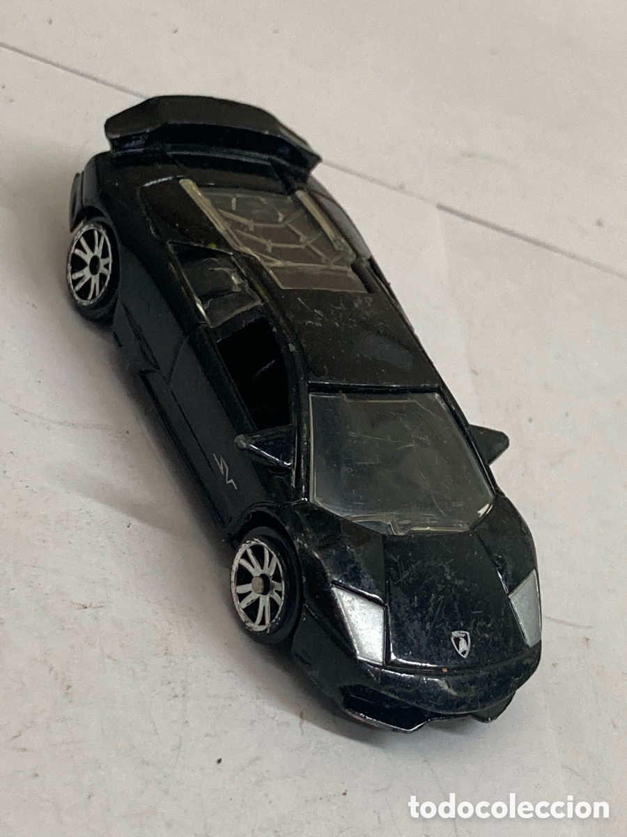 Coches a escala: coche de juguete a escala Motor Max Lamborghini Murci&eacute;lago negro.