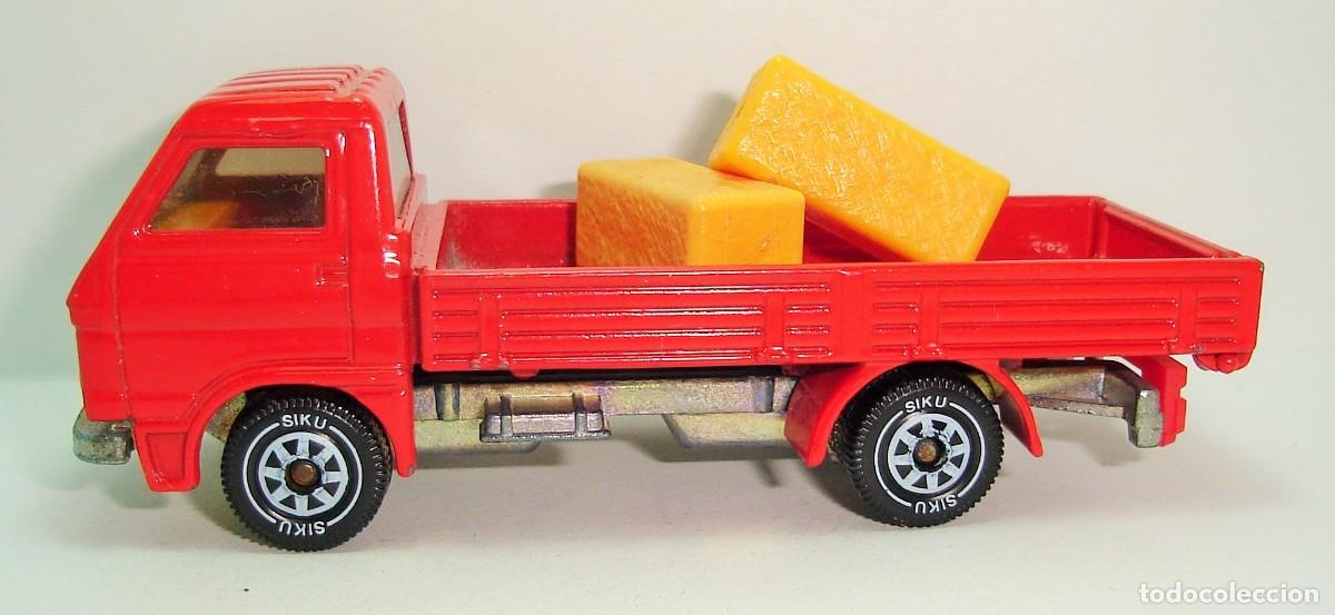 Coches a escala: CAMION MAN VOLKSWAGEN PICK-UP SIKU ESCALA 1:64