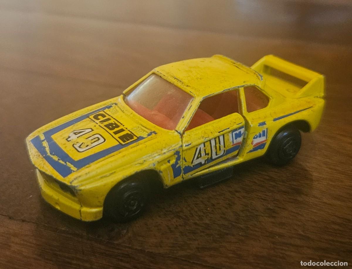 Coches a escala: GUISVAL - BMW 3.3 CSL serie Campe&oacute;n Rallye 1/64 1:64 amarillo Rally n&deg; ref 29 dorsal 40 Cibie raro