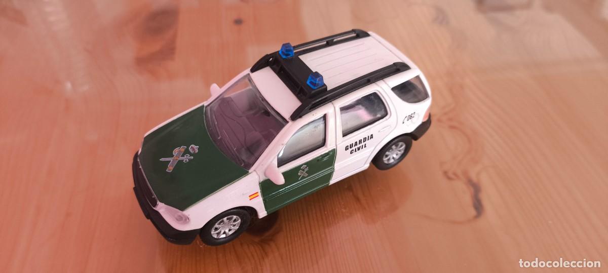 Coches a escala: COCHE TODOTERRENO GUARDIA CIVIL DE TRAFICO , MARCA ATOSA CON PEANA