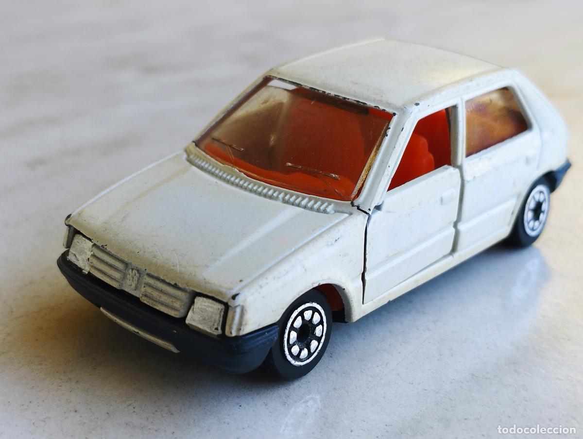 Coches a escala: PEUGEOT 205 GUISVAL CAMPEON 1,64 MIRA DESCRIPCION