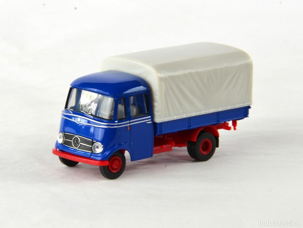 Coches a escala: Brekina Starmada Escala 1:87 H0 Mercedes Benz L319 Azul y Rojo Impecable con Caja