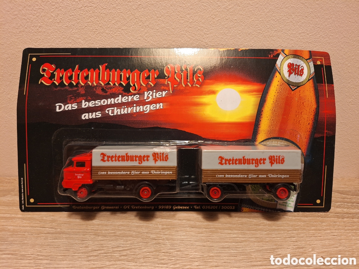 Coches a escala: CAMI&Oacute;N TRETENBURGER PILS &ndash; FREIGHTLINER FLD 120 &ndash; 1:87 H0 &ndash; WERBETRUCK